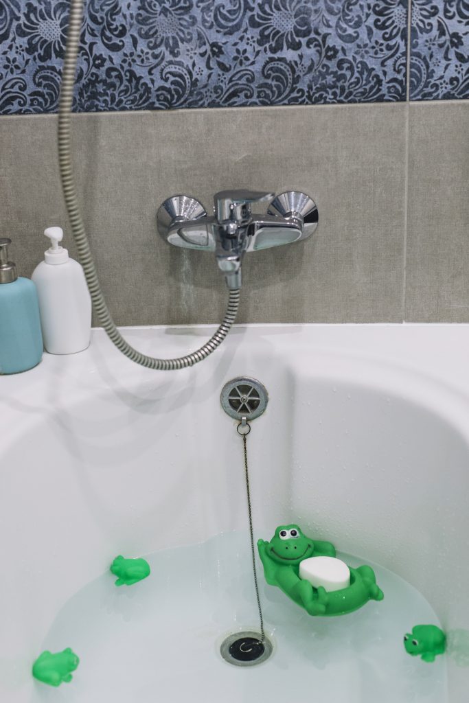 bathtub with toys soap